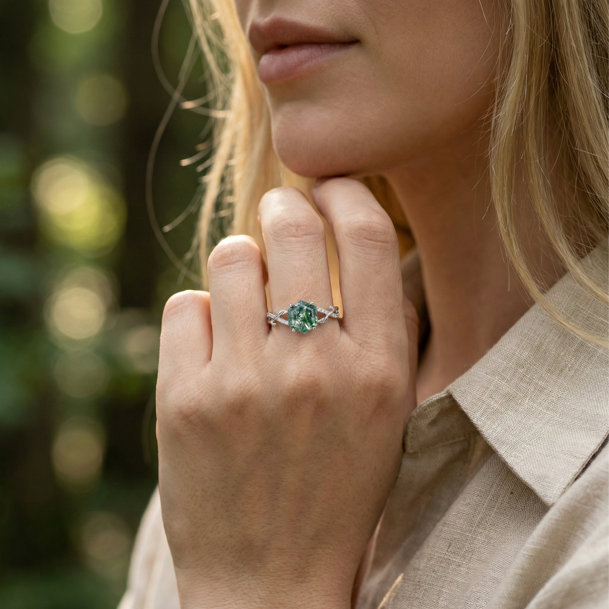 Model wearing the hexagonal moss agate sterling silver ring with a vine-inspired diamond band.