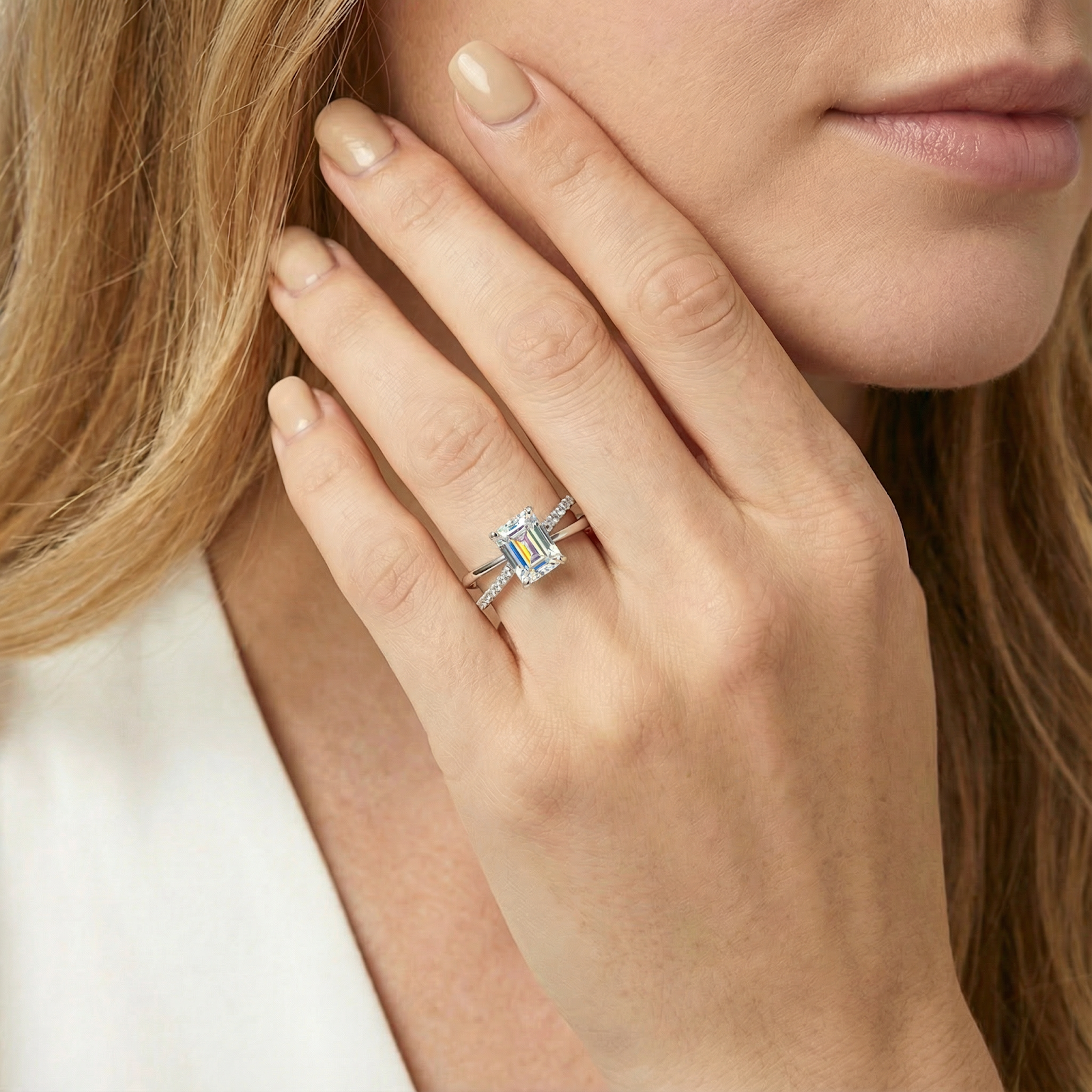 Woman wearing the S925 sterling silver radiant cut simulated diamond bypass ring on her ring finger.