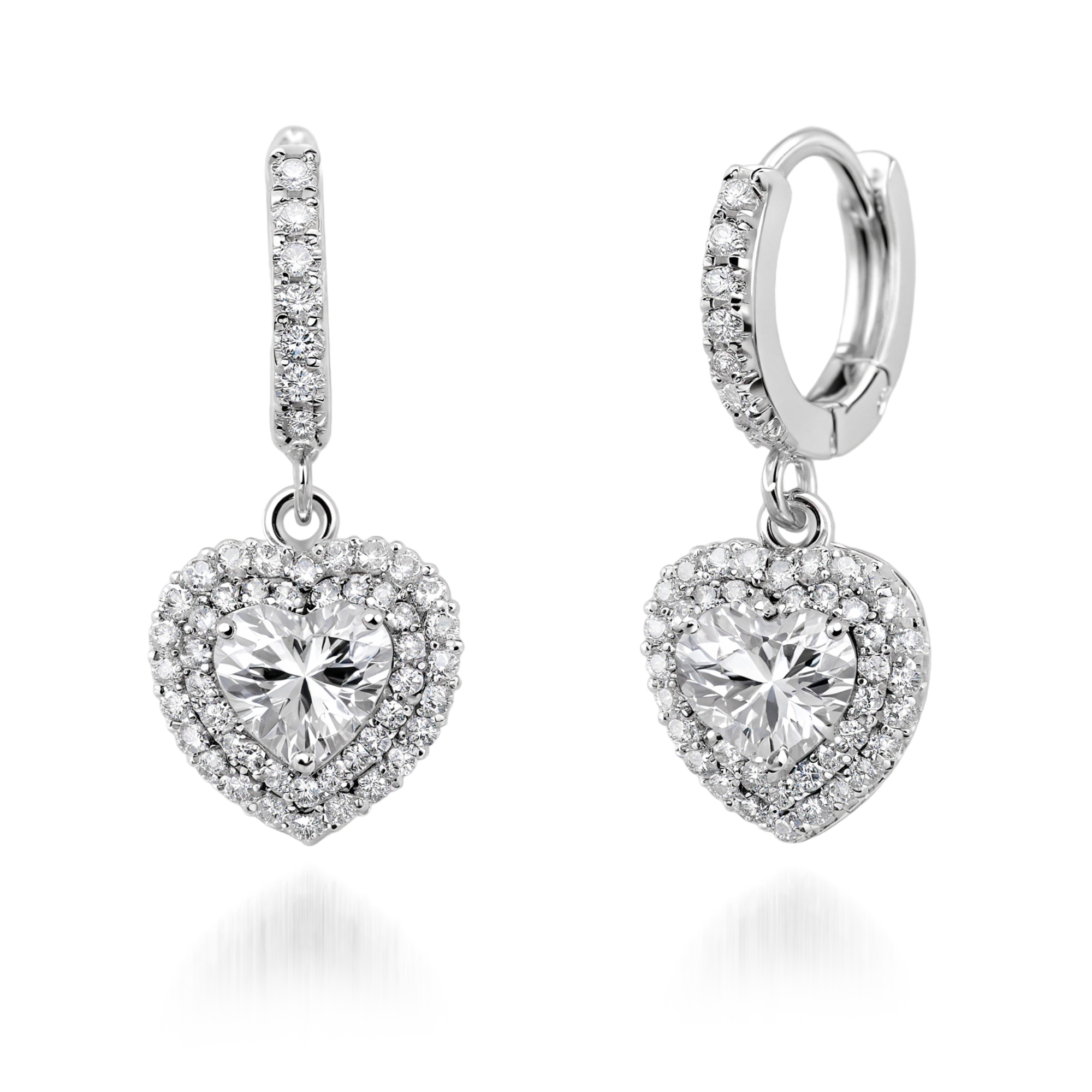 Élégantes boucles d'oreilles pendantes cœur en diamant