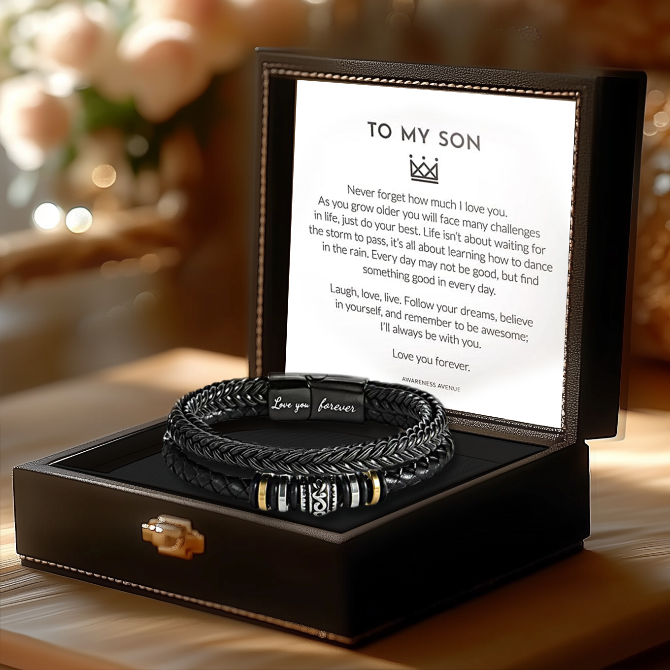 Sleek mom to son bracelet with engraved heartfelt message in stainless steel.