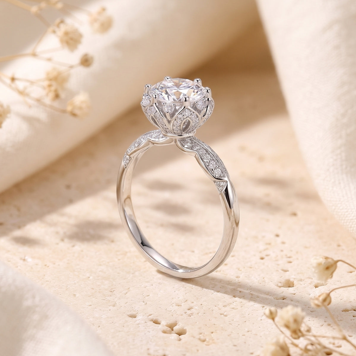 Side profile of the silver ring showcasing the high-set lotus petal basket holding a round stone.