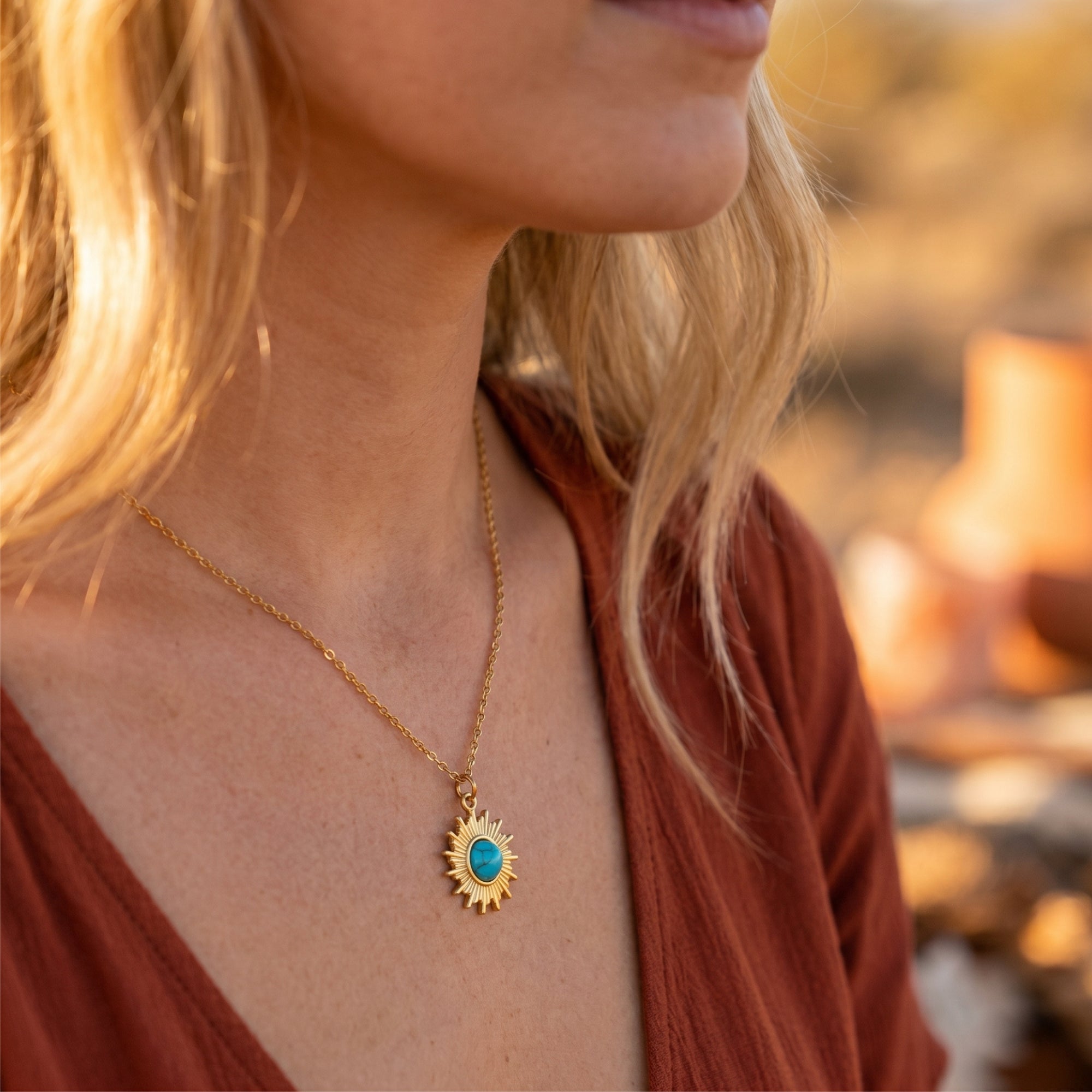 Model wearing the gold Tala turquoise necklace, showing the 18-inch chain length and pendant.