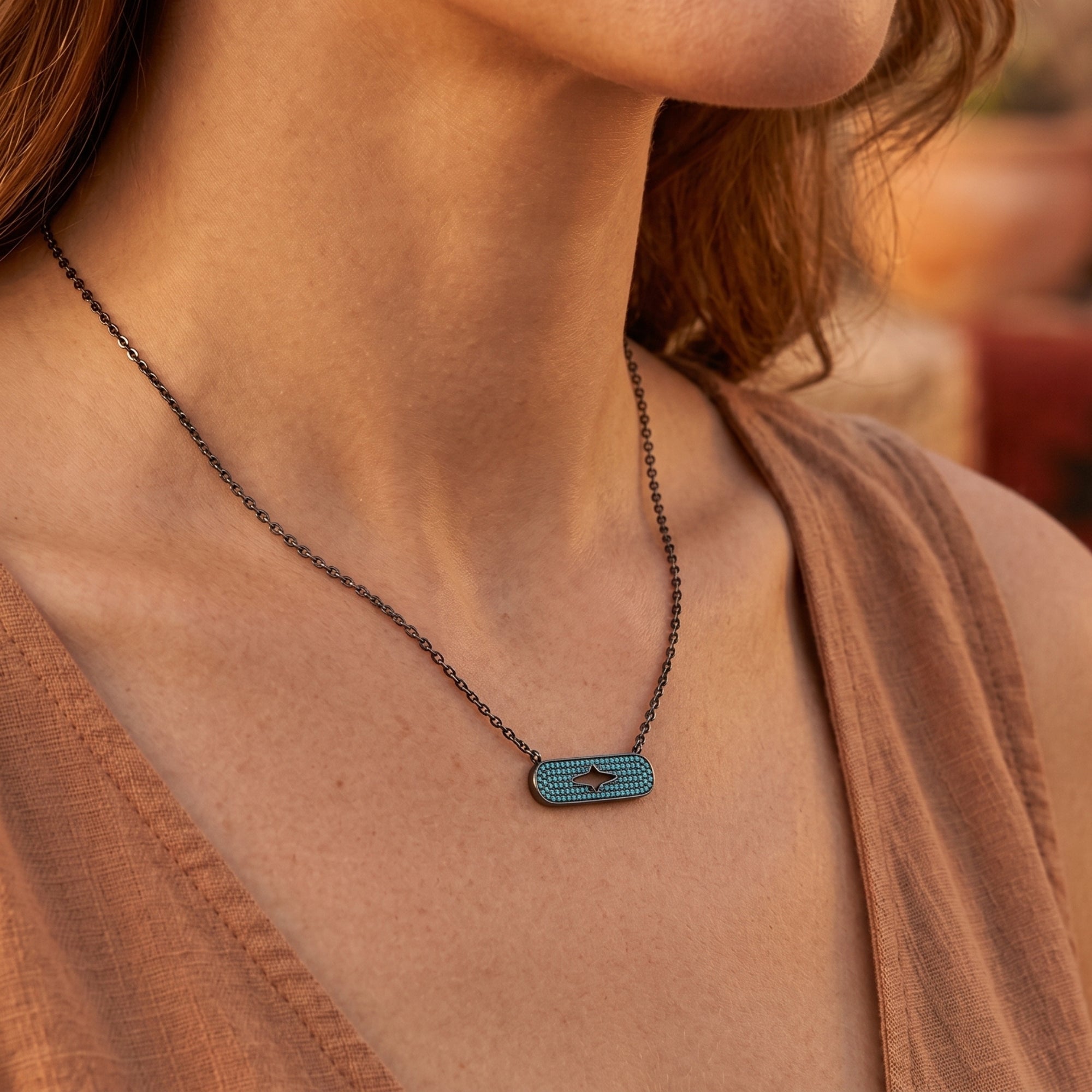 Sterling silver Chaco turquoise bar necklace worn by a model, featuring a modern horizontal silhouette.