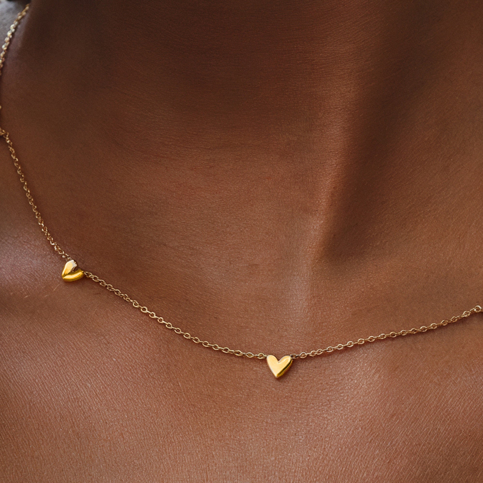 Solid gold heart chain necklace featuring 6mm charms