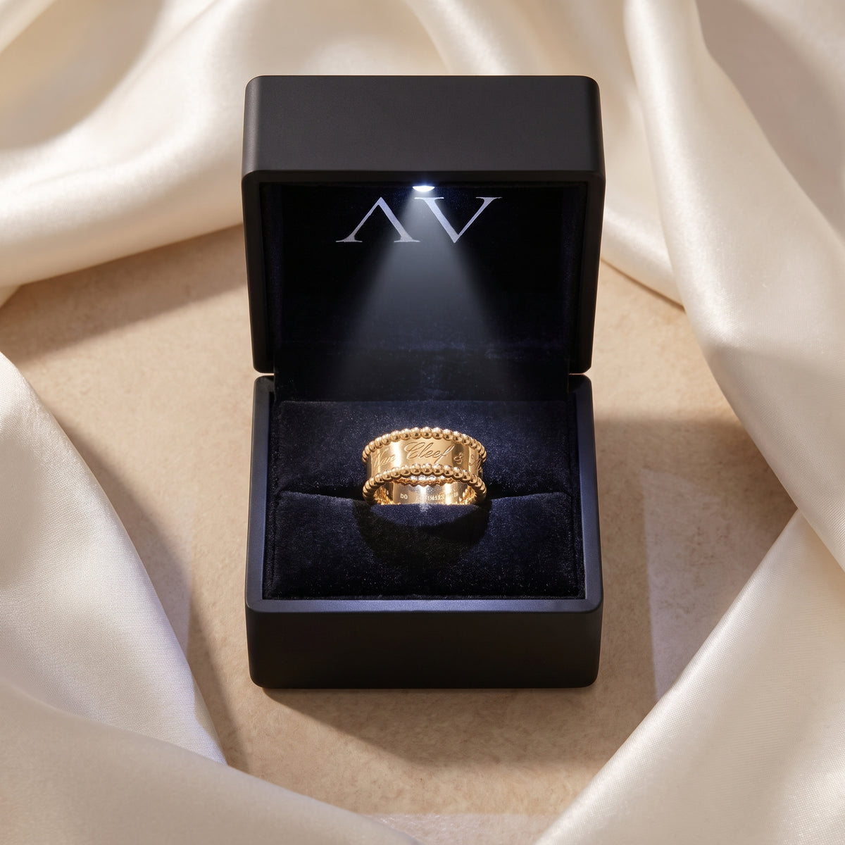 The Vowbound Ring in 18K gold vermeil presented in a premium black lighted jewelry gift box.