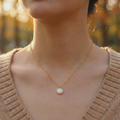 Natural opal halo solid gold necklace.