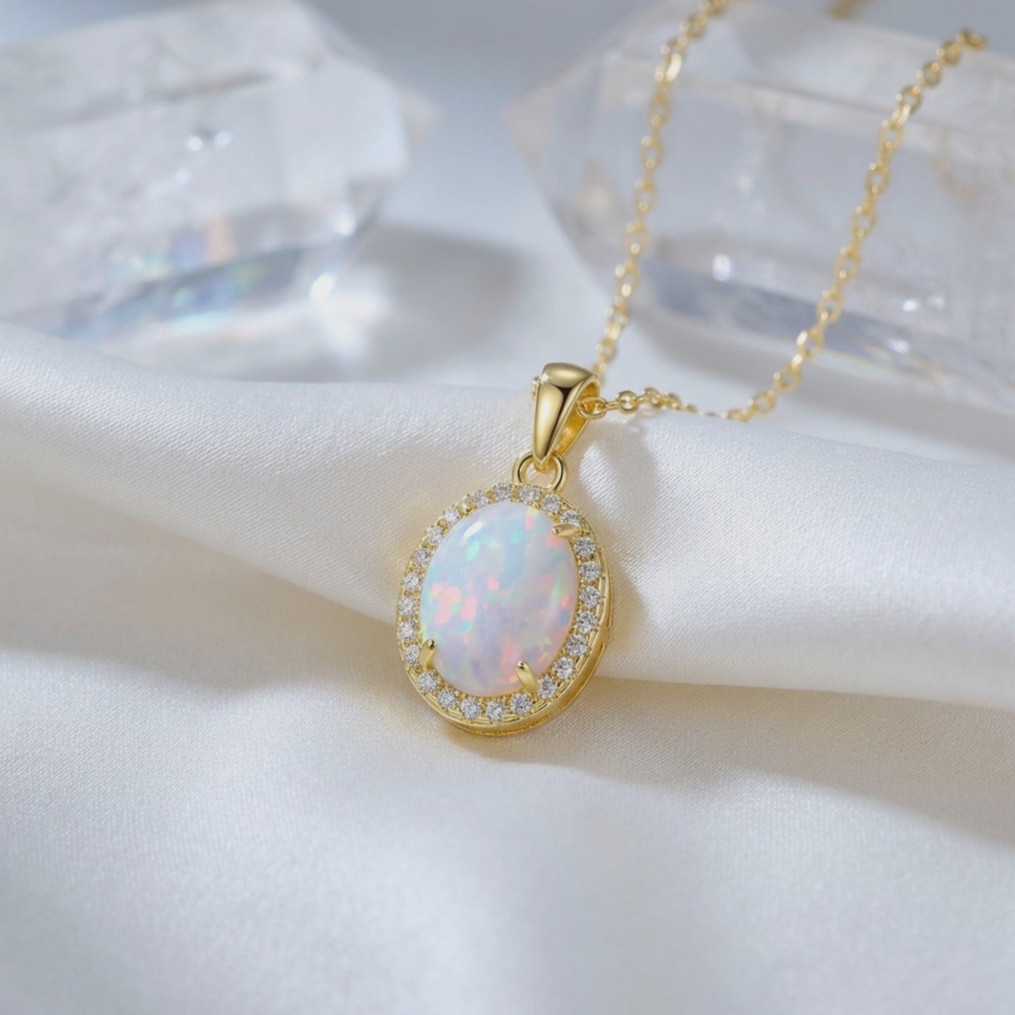 Oval opal pendant necklace in solid gold.