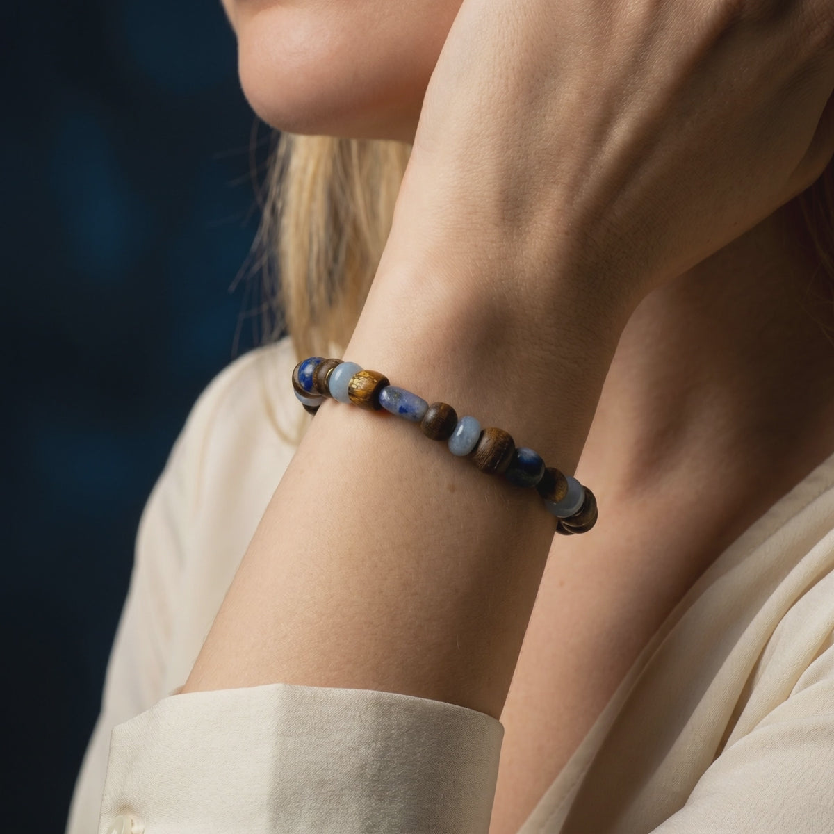 A solid gold Lapis Lazuli bead bracelet.