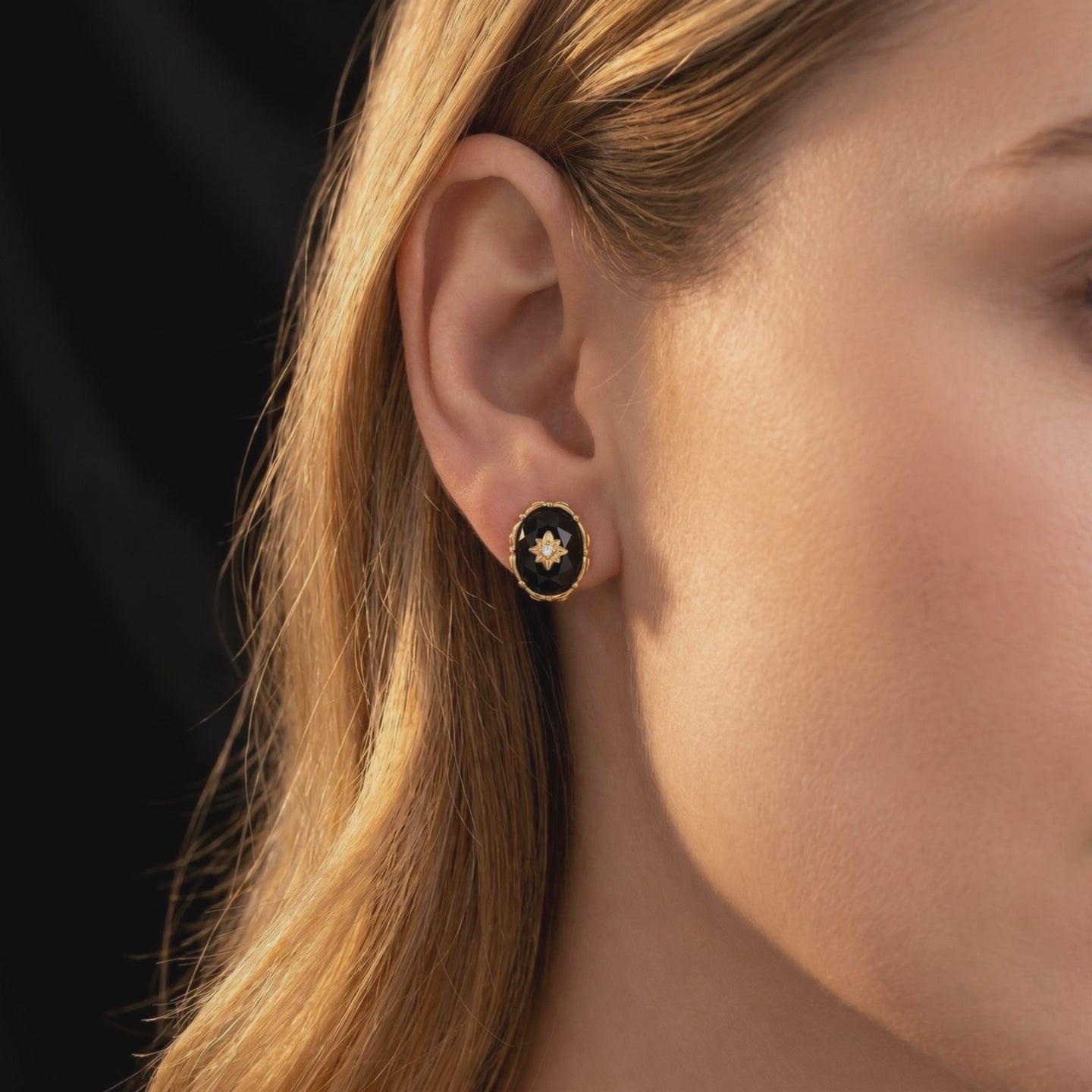 Nerezza black onyx drop earrings in solid gold.