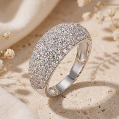 Solid gold ring with pave-set cubic zirconia.