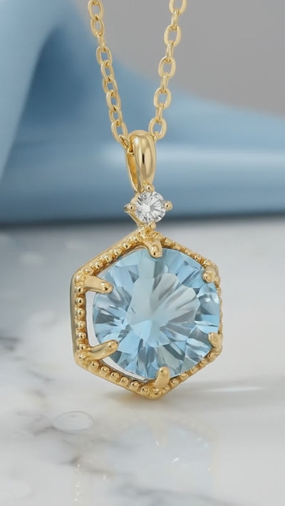 The Callia Hex simulated aquamarine solid gold necklace.