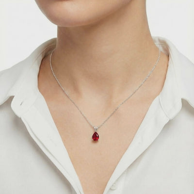 Pear cut red moissanite solid gold necklace.