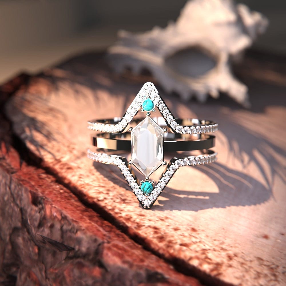 Elegant Calm Waters Turquoise Ring featuring a sterling silver band with big transparent cubic zirconia gemstone close up